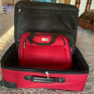 Red Protocol luggage w/ carry on and toiletry bag. 12.5 X 20.5 inches.
